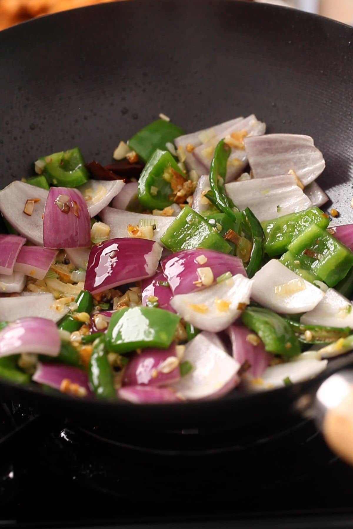 Bell Pepper and onion are stir fried.
