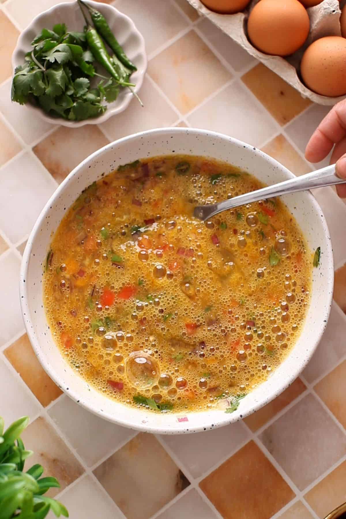 Beaten spiced egg mixture for making french toasts.