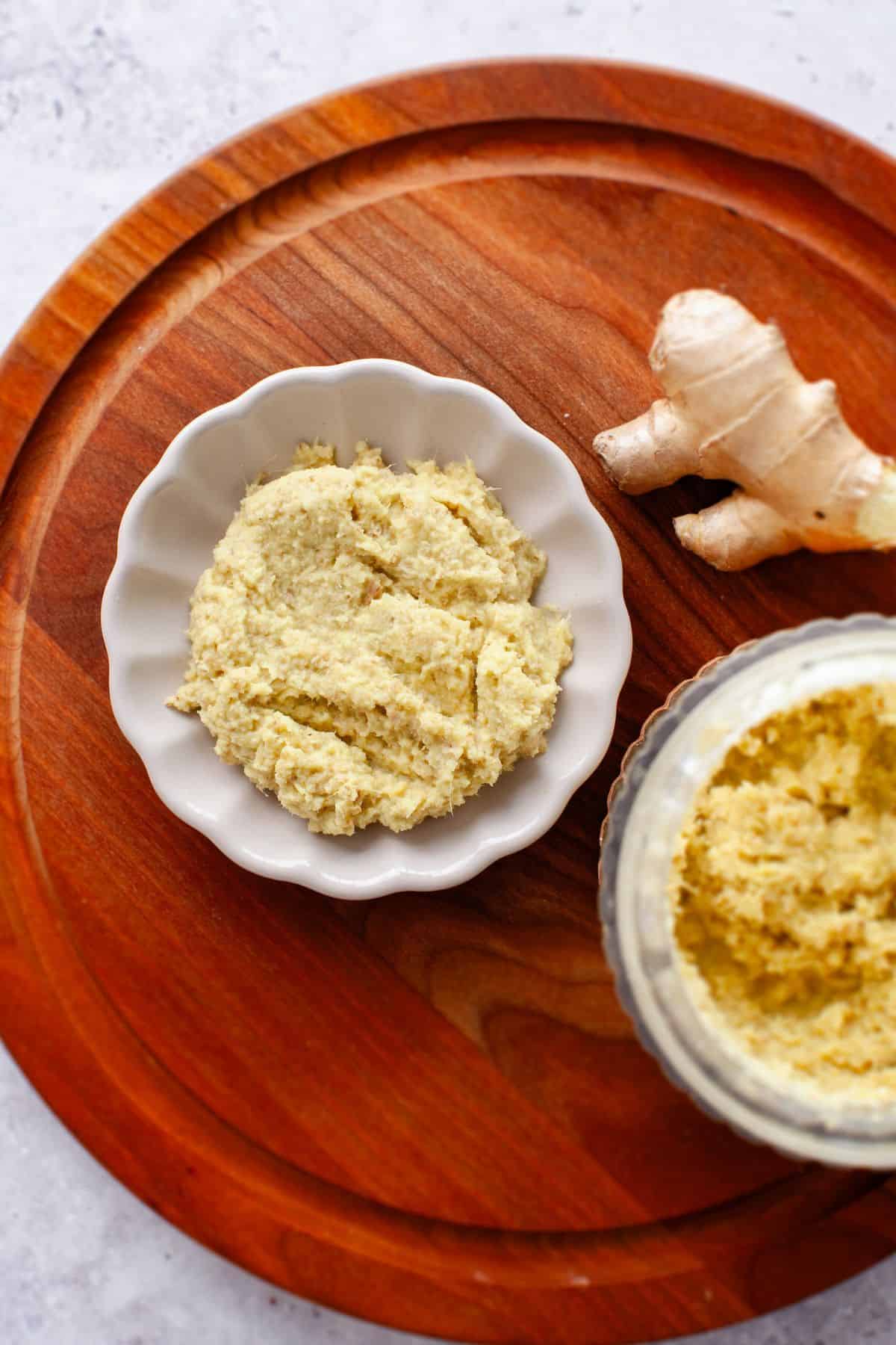 Top view of ginger paste in a white dish.