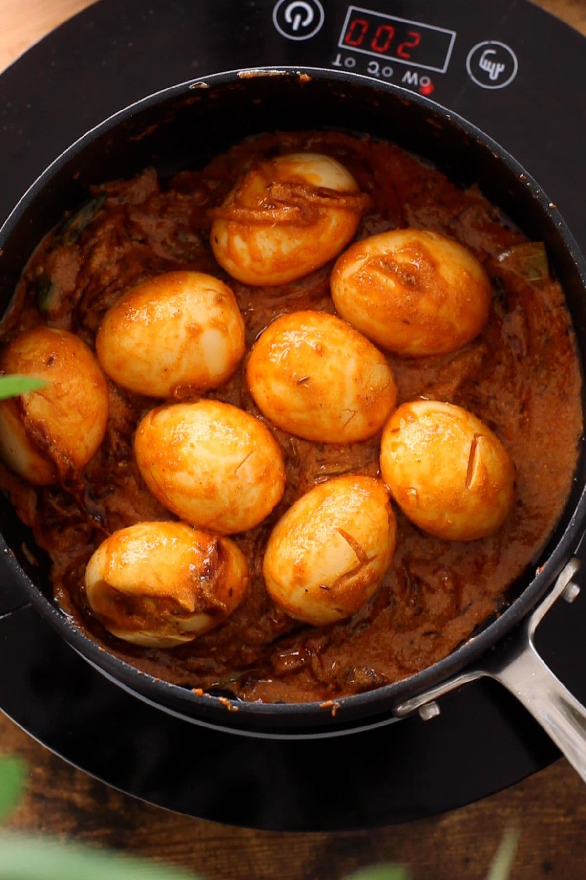 Egg masala is ready for layering with rice.