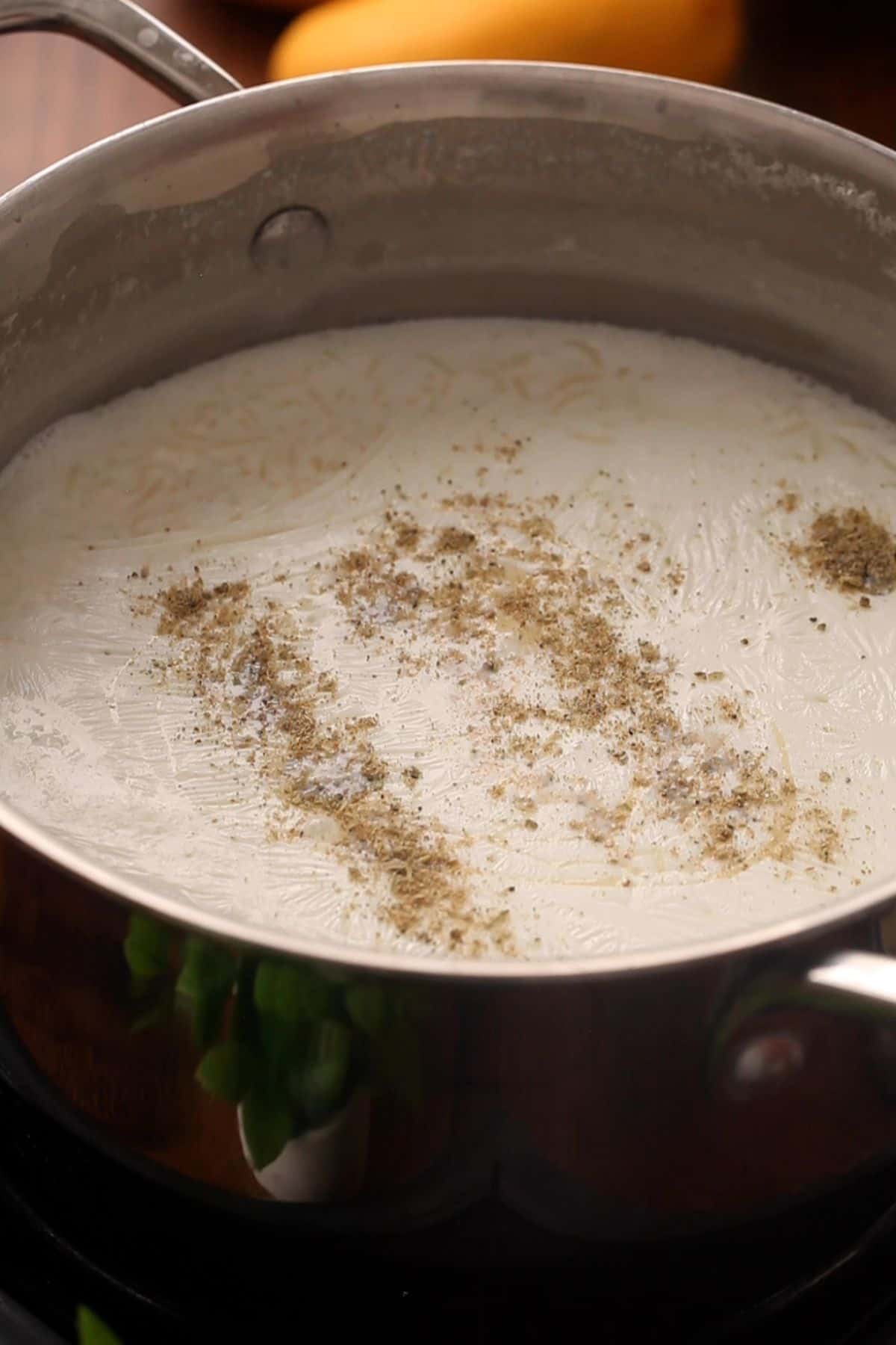 Ground cardamom is added to the rice pudding.