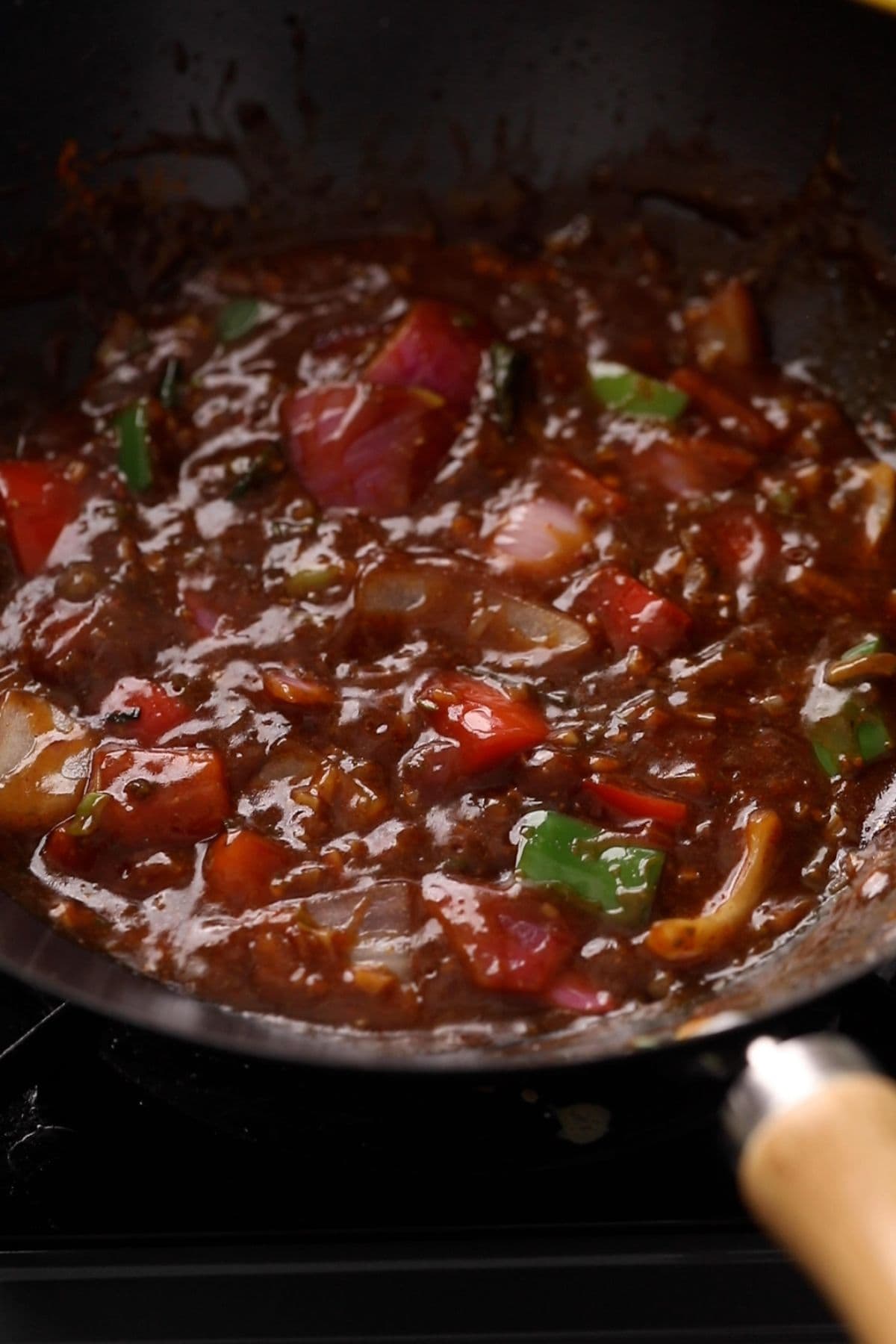 Sauce is cooked until its thick and glistening.