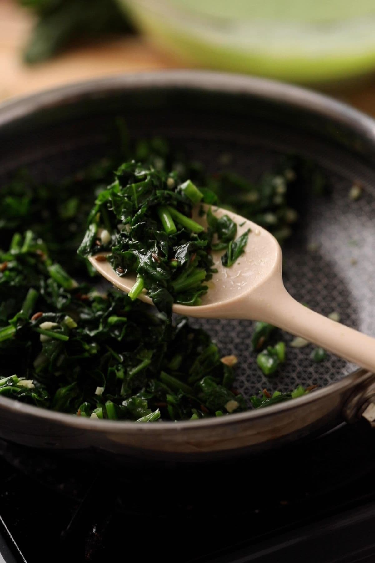 Sauteed spinach with aromatics and cumin.