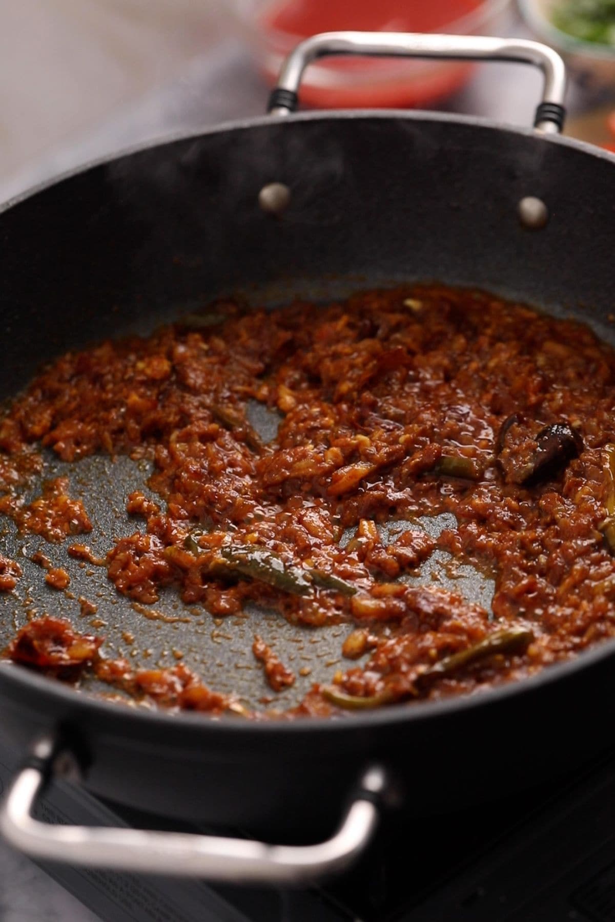 Spice paste is browned and oil is separating.