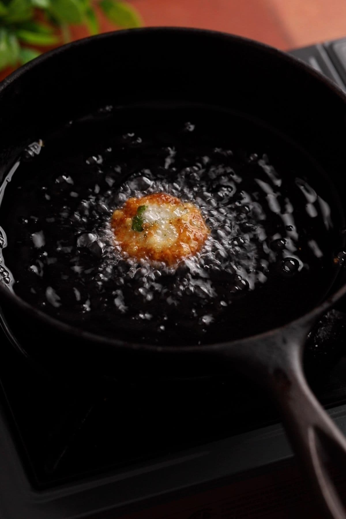 The mixture isnt spreading and oil is ready for frying.