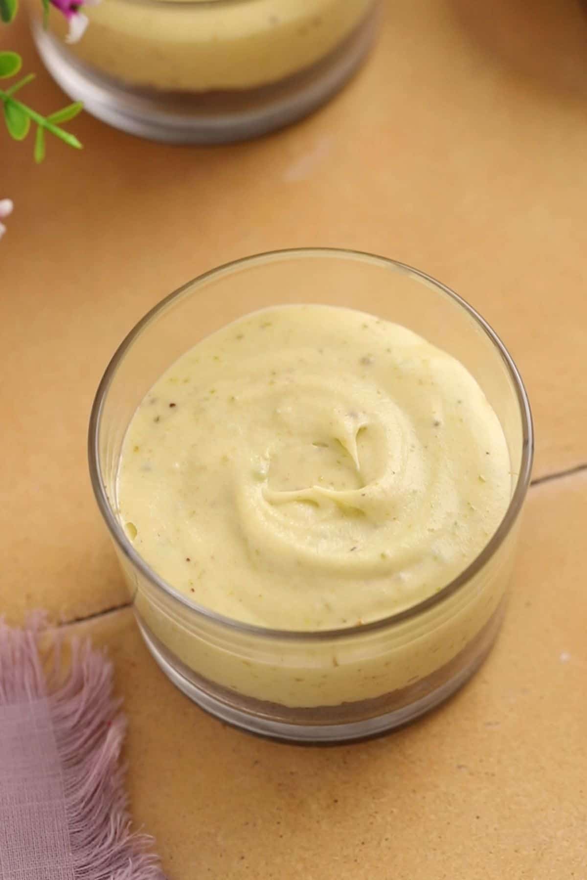 Cheesecake filling is added over the cookie crumbs.