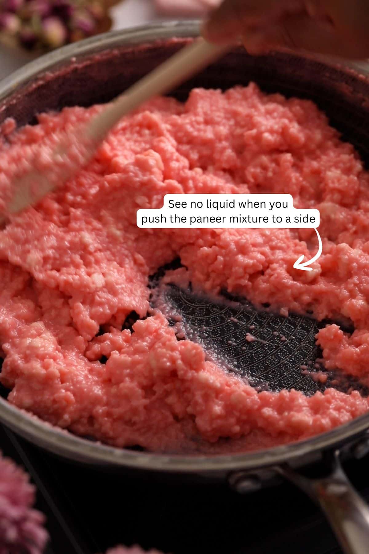 Kalakand mixture is being slowly cooked.