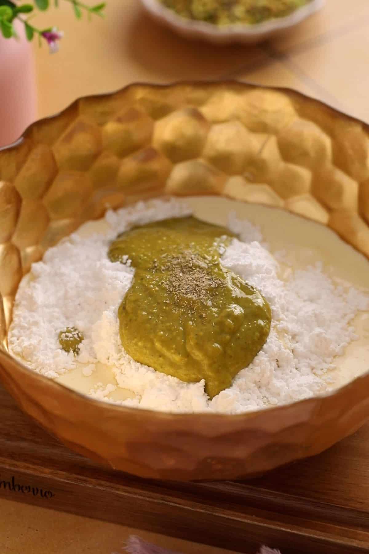 Cheesecake filling ingredients in a golden bowl. 