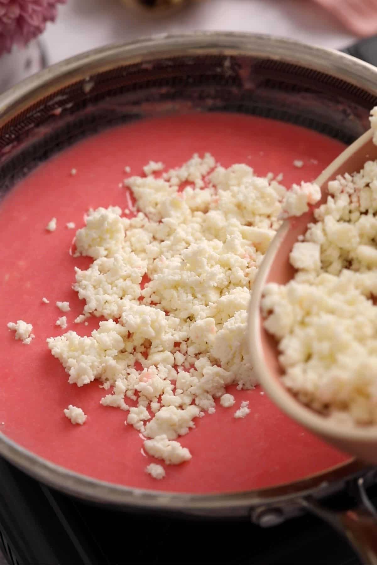 Paneer is added to rose milk mixture.