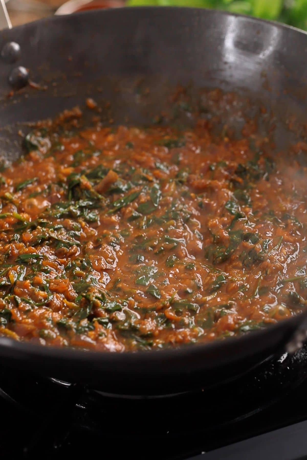 Methi gravy is being sauteed.